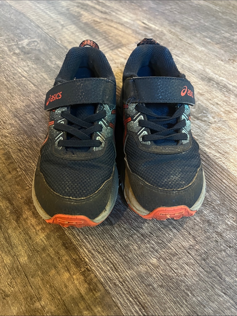 ASICS Kids Black Sneakers with Orange Accents